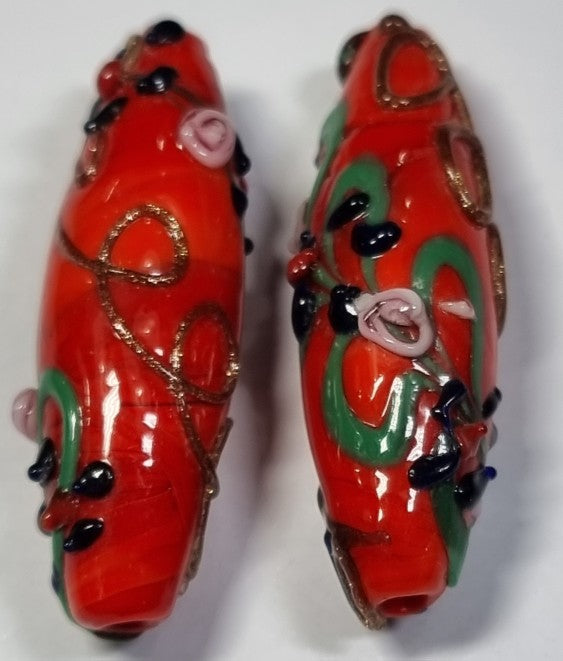45-47x15MM H/MADE LAMPWORK BEADS - LARGE RICE - RED/FLORAL