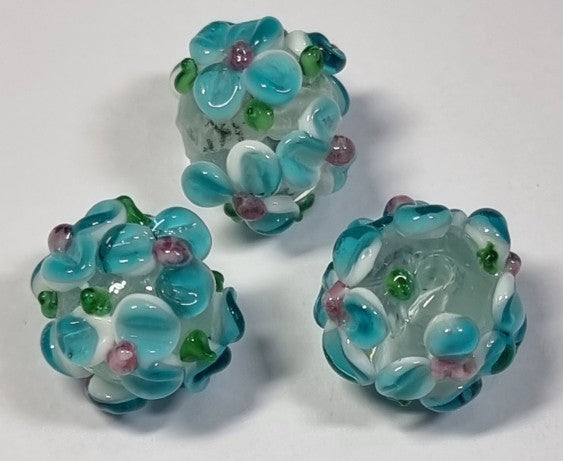 15X13MM H/MADE LAMPWORK BEADS - RONDELLE - CLEAR/ BLUE FLORAL