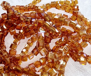 CUBES - 4MM GLASS - FACETED ELECTROPLATED DARK ORANGE