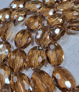 OVALS - 16 x 12 x 7MM FACETED CRYSTAL GLASS - LIGHT GOLDENROD