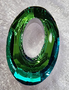 JUMPRINGS- 20 X 13MM LINKING RINGS - FACETED GREEN VITRAIL COLOUR