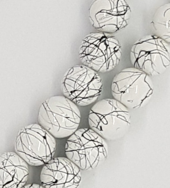 10MM GLASS BEADS - 25 per packet - WHITE - with black splash