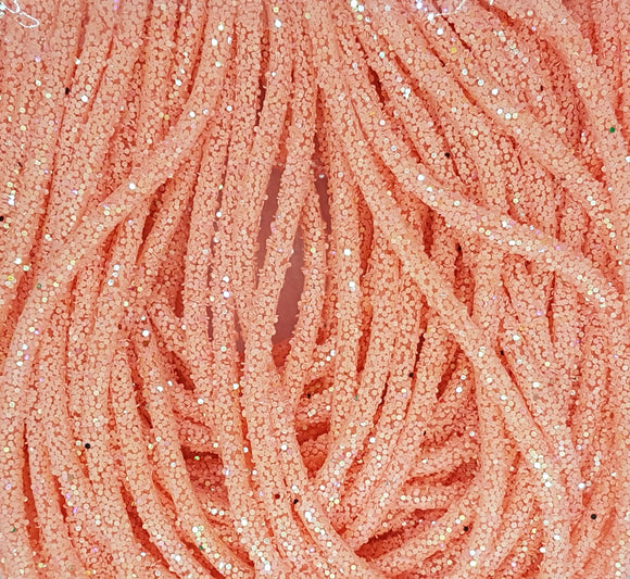 CORD - RUBBER  - HOLLOW - 5-6MM SALMON PINK COLOUR WITH PAILLETTES