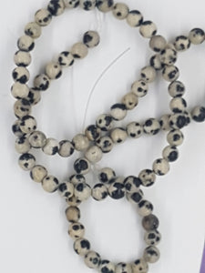 4MM PALE GOLDEN ROD DALMATIAN BEADS