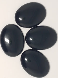 CABOCHONS 40 X 30 X 8MM OVAL NATURAL BLACK AGATE