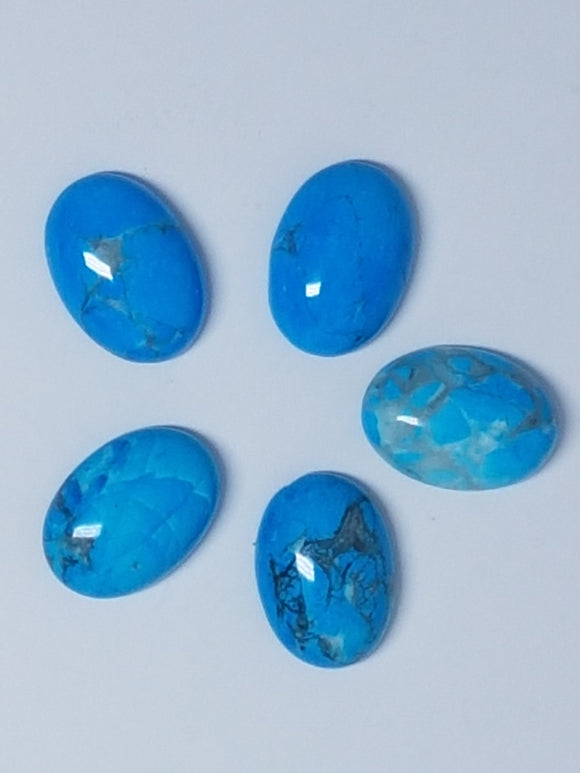 CABOCHONS 14X10MM OVAL NATURAL DYED HOWLITE