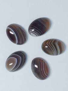 CABOCHONS 14X10MM OVAL NATURAL BOTSWANA AGATE