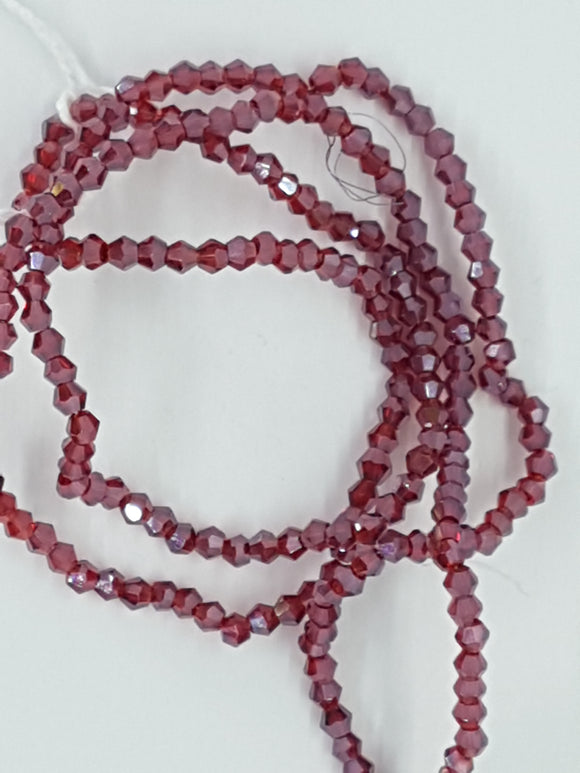 BICONES - 2MM CRYSTAL GLASS FACETED BEADS - Per Strand - TRANS. RED PLATED