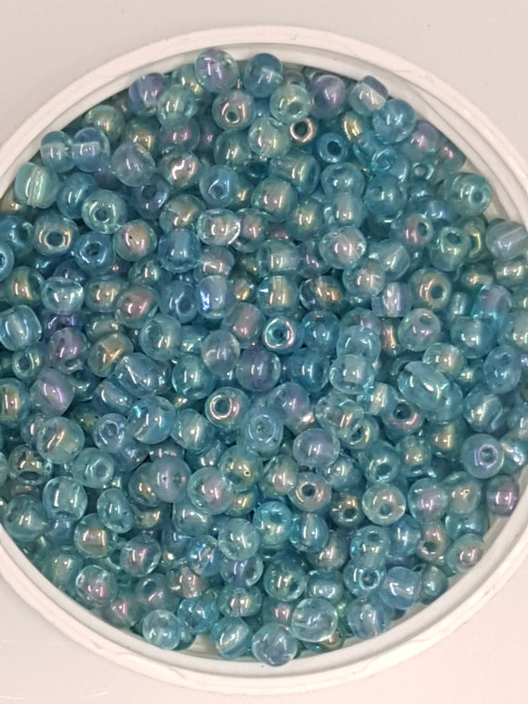 6/0 CHINESE ROUND SEED BEADS - TRANS. RAINBOW - AQUA