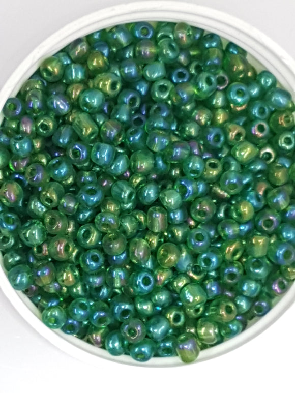 6/0 CHINESE ROUND SEED BEADS - TRANS. RAINBOW - DARK GREEN NO 2