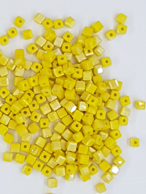 CUBES - 3X3MM GLASS FACETED CUBES - YELLOW AB
