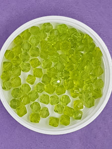 BICONES - 6MM GLASS FACETED BEADS - COLOUR - YELLOW/GREEN