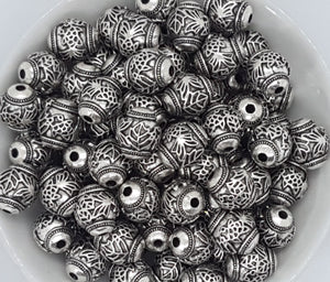 ANTIQUE SILVER METAL - 14X11MM TIBETAN STYLE CARVED OVAL BEADS